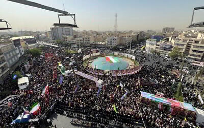 Mourners gather in Enghelab Square to attend the funeral ceremony of the Iranian army generals, nuclear scientists and their family members who were killed in Israeli strikes, in Tehran, Iran, June 28, 2025. (AP Photo/Vahid Salemi)