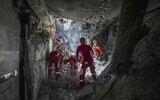 Rescuers search through the rubble of a damaged section of Evin Prison following an Israeli strike the day before, in Tehran, Iran, June 24, 2025. (Mostafa Roudaki/Mizan News Agency/AP)