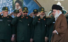 Iran's Supreme Leader Ayatollah Ali Khamenei, right, arrives at a graduation ceremony of Islamic Revolutionary Guard Corps officers, May 20, 2015. (Office of the Iranian Supreme Leader via AP)