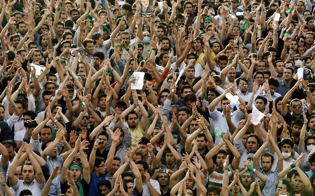 Supporters of Iranian presidential candidate Mir-Hossein Mousavi protest against the result of the recent election, which they say was fraudulent, at the Azadi (Freedom) Square in Tehran, Iran, June 15, 2009. (AP/Ben Curtis) Supporters of Iranian presidential candidate Mir-Hossein Mousavi protest against the result of the recent election, which they say was fraudulent, at the Azadi (Freedom) Square in Tehran, Iran, June 15, 2009. (AP/Ben Curtis)