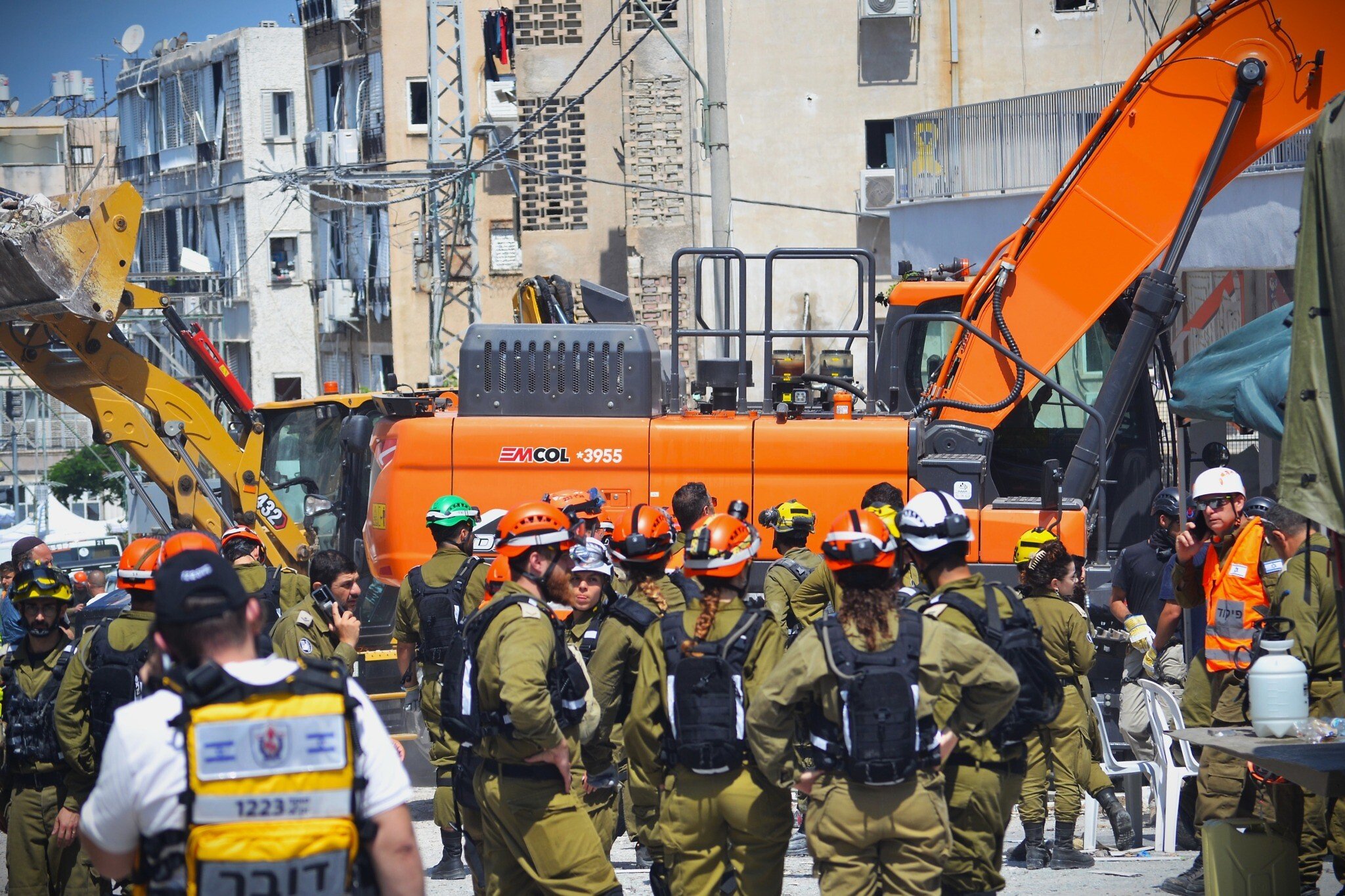 In a race against time, amid grief and dust, Bat Yam searches for survivors of Iran strike
