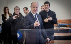 National Security Adviser Tzachi Hanegbi arrives for a court hearing in the trial against Prime Minister Benjamin Netanyahu (not in picture), at the District Court in Jerusalem on March 5, 2024. (Chaim Goldberg/Flash90)