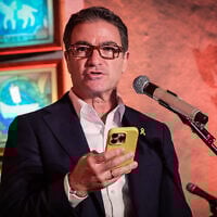 Former Mossad chief Yossi Cohen attends a menorah-lighting ceremony on the sixth night of Hanukkah, at the Great Synagogue in Tel Aviv, December 30, 2024. (Avshalom Sassoni/ Flash90/ File)