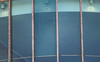A shattered window at the Supreme Court building in Jerusalem, June 6, 2025. (Oren Ben Hakoon/Flash90)