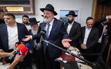 Shas party leader Aryeh Deri and spiritual leader Rabbi Yitzhak Yosef visit the scene of suspected arson and vandalism at a Jerusalem synagogue on June 8, 2025. (Photo by Yonatan Sindel/Flash90)