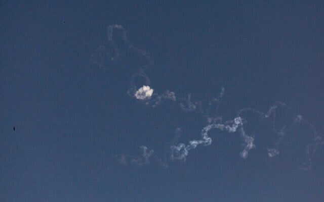 Smoke trails seen after a missile fired from Yemen was intercepted, as it seen from Jerusalem, June 10, 2025. (Yonatan Sindel/Flash90)