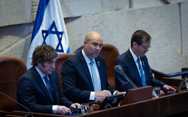 Knesset Speaker Amir Ohana (center) speaks alongside Argentinian President Javier Milei (left) at the Knesset in Jerusalem, June 11, 2025. (Yonatan Sindel/Flash90) Knesset Speaker Amir Ohana (center) speaks alongside Argentinian President Javier Milei (left) at the Knesset in Jerusalem, June 11, 2025. (Yonatan Sindel/Flash90)
