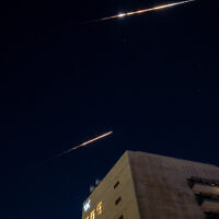 File: Interception from a missile attack on Israel fired from Iran, as seen from Jerusalem, early on June 14, 2025. (Yonatan SIndel/Flash90)