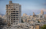 The scene of an apartment building destroyed by an Iranian ballistic missile impact, in Bat Yam, June 15, 2025. (Chaim Goldberg/Flash90)