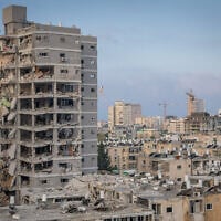The scene of an apartment building destroyed by an Iranian ballistic missile impact, in Bat Yam, June 15, 2025. (Chaim Goldberg/Flash90)