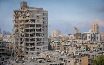The scene of an apartment building destroyed by an Iranian ballistic missile impact, in Bat Yam, June 15, 2025. (Chaim Goldberg/Flash90)