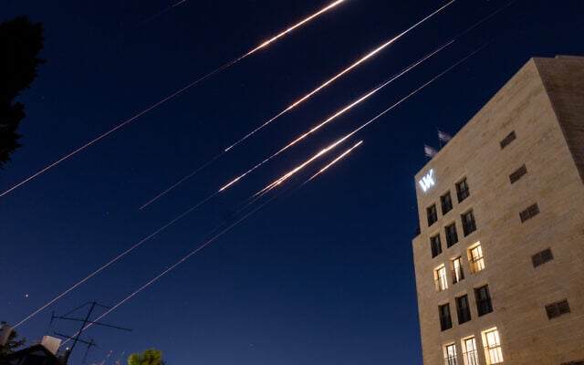 An Iranian missile is seen being intercepted above the skies of Jerusalem early on June 15, 2025. (Chaim Goldberg/Flash90)