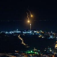 Shrpanel is seen falling over East Jerusalem on June 16, 2025. (Yonatan Sindel/Flash90)