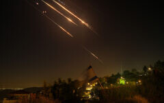 Israeli air defense systems fire to intercept missiles during an Iranian attack, as seen near the border with Lebanon June 18, 2025. (Ayal Margolin/Flash90)