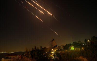 Israeli air defense systems fire to intercept missiles during an Iranian attack, as seen near the border with Lebanon June 18, 2025. (Ayal Margolin/Flash90)