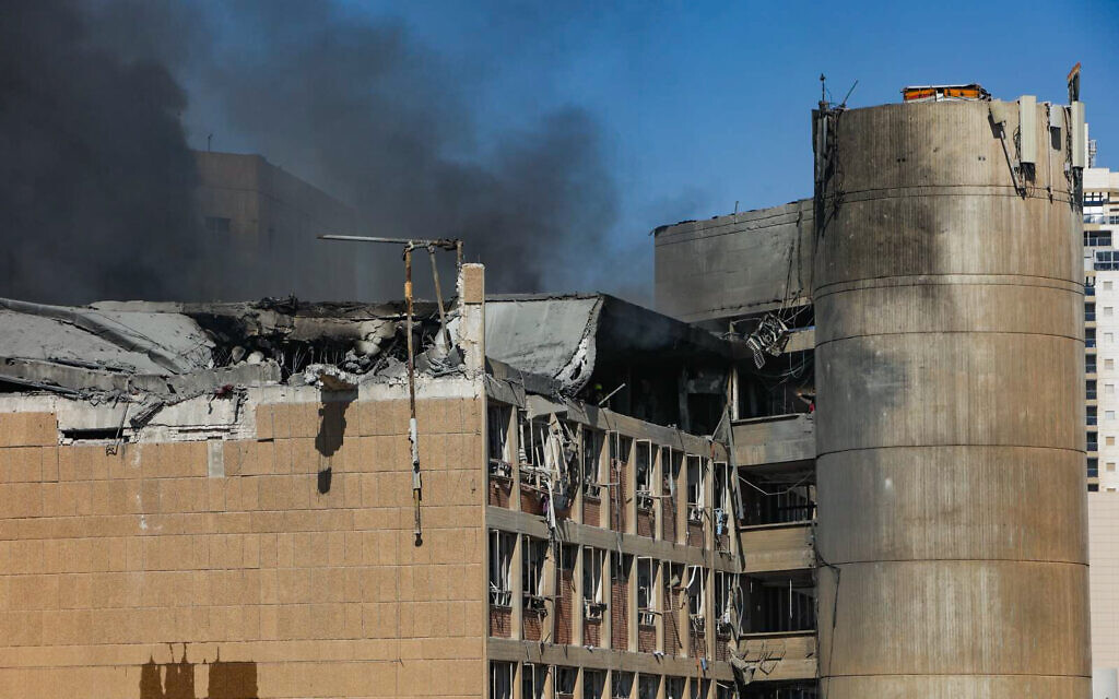 Smoke rises from the scene where a ballistic missile fired from Iran hit and caused damage at Soroka Medical (Dudu Greenspan/Flash90)