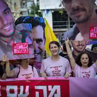 Relatives of Israelis held hostage by Hamas in Gaza and supporters protest for their release, outside the Likud party's headquarters in Tel Aviv, June 21, 2025. (Erik Marmor/Flash90)