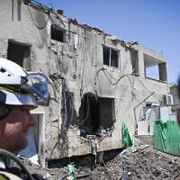 Security and rescue services at the scene where a drone fired from Iran hit and caused damage to a home in Beit She'an, June 21, 2025. (Michael Giladi/Flash90)