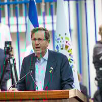 President Isaac Herzog at the funeral of slain hostage Yonatan Samerano in Tel Aviv, June 24, 2025. (Chaim Goldberg/Flash90)