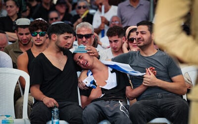 Family and friends of Israeli soldier Staff Sgt. Ronel Ben-Moshe attend his funeral at the military cemetery in Rehovot on June 25, 2025. He was killed in combat in the Gaza Strip. (Yossi Aloni/Flash90)