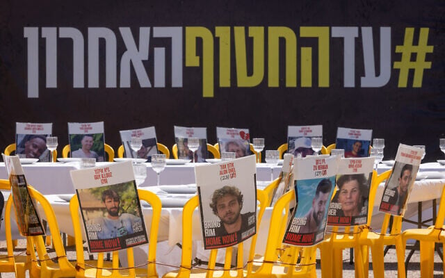Posters of the Gaza hostages are displayed in Hostages Square in Tel Aviv, June 26, 2025. (Miriam Alster/Flash90)