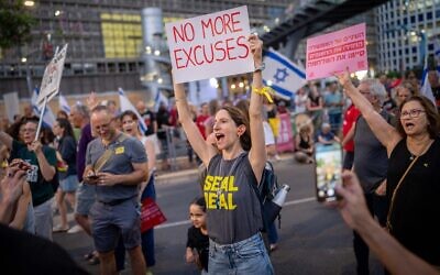 Demonstrators protest for the release of hostages held by Palestinian terrorists in the Gaza Strip, outside the Kirya military headquarters in Tel Aviv, June 28, 2025. (Erik Marmor/Flash90)