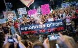 Demonstrators protest for the release of Israelis held hostage in the Gaza Strip outside Hakirya Base in Tel Aviv, June 28, 2025. (Erik Marmor/Flash90)