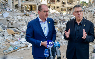 German Interior Minister Alexander Dobrindt, left, and Foreign Minister Gideon Sa'ar visit the scene where a ballistic missile fired from Iran impacted in Bat Yam on June 29, 2025. (Avshalom Sassoni/ Flash90) German Interior Minister Alexander Dobrindt, left, and Foreign Minister Gideon Sa'ar visit the scene where a ballistic missile fired from Iran impacted in Bat Yam on June 29, 2025. (Avshalom Sassoni/ Flash90)