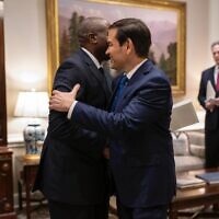British Foreign Secretary David Lammy hugs US Secretary of State Marco Rubio in the White House on June 19, 2025. (UK Foreign Office)