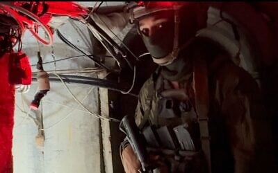 An officer in the IDF Golani Brigade's reconnaissance company in the tunnel under a Khan Younis hospital in which Hamas military leader Mohammed Sinwar was killed, June 8, 2025. (Lazar Berman/The Times of Israel)