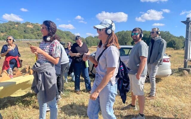 Getting into the groove with tour guide and DJ Ziv Rom of Soundtrack baTeva on June 1, 2025 (Jessica Steinberg/Times of Israel)