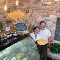 Nelia and Gregory Shaver of Grineli Cheeses, their boutique cheesemaking business that they opened in the Golan Heights on October 6, 2023, the day before the October 7 Hamas attack (Jessica Steinberg/Times of Israel)