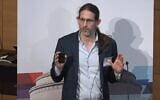 MIT professor Retsef Levi lectures on the effects of generative AI on commerce at the Massachusetts Institute of Technology in Cambridge, December 18, 2023. (YouTube screenshot)