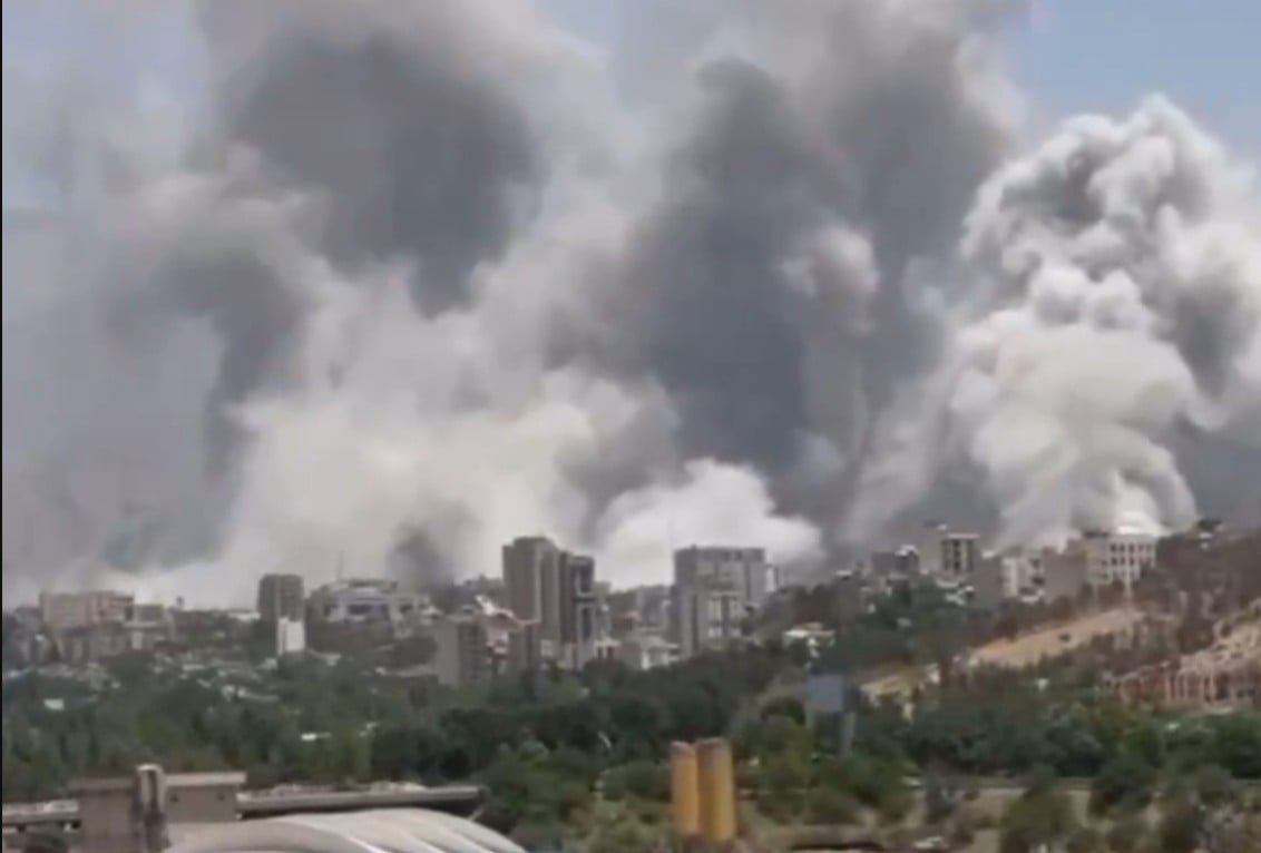 In Tehran, IDF strikes IRGC sites, gate of Evin Prison, ‘Destruction of Israel’ clock