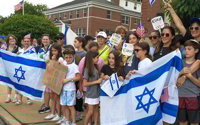 Supporters of former Hamas hostage Edan Alexander wait to welcome him back to his hometown of Tenafly, New Jersey, June 19, 2025. (Liri Agami/Flash90)