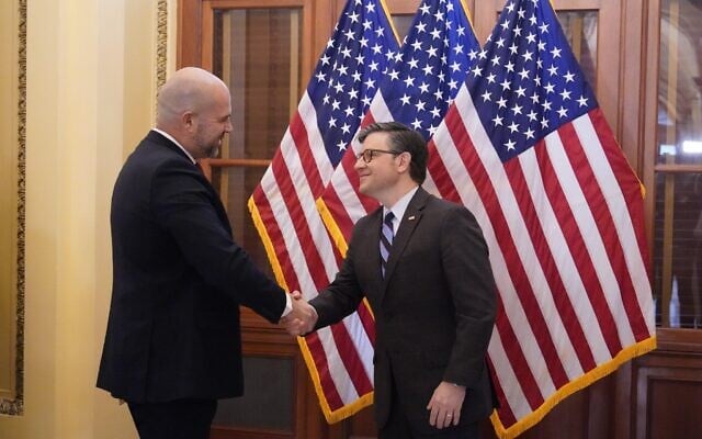 Knesset Speaker Amir Ohana (left) shakes hands with US House Speaker Mike Johnson in Washington, February 7, 2024 (Press Office of the Speaker of the House of Representatives) Knesset Speaker Amir Ohana (left) shakes hands with US House Speaker Mike Johnson in Washington, February 7, 2024 (Press Office of the Speaker of the House of Representatives)