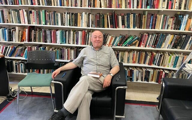 Michael Marmur, a Reform rabbi based in Jerusalem and associate professor at Hebrew Union College, in his office on June 10, 2025. (Rossella Tercatin/Times of Israel)