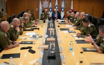 Defense Minister Israel Katz, center right, meets with IDF Chief of Staff Lt. Gen. Eyal Zamir, center left, and members of the military's top brass ahead of the Israeli operation against Iran's nuclear program, June 13, 2025. (Defense Ministry)