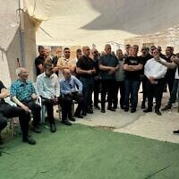 Benny Gantz and other National Union MKs visit the city of Tamra on June 16, 2025, after it was hit in a Iranian missile strike. (Courtesy National Unity)