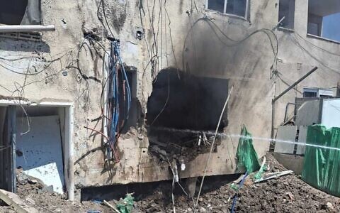 An Iranian drone impact on a building in Beit She'an, June 21, 2025. (Magen David Adom)