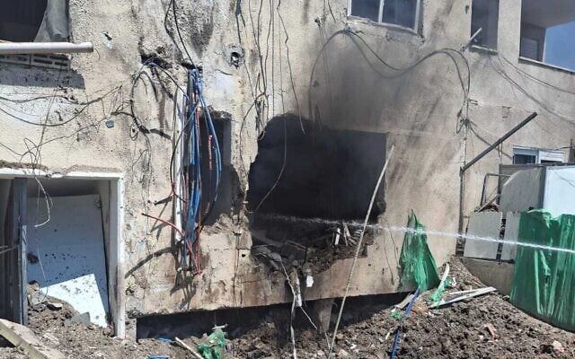 An Iranian drone impact on a building in Beit She'an, June 21, 2025. (Magen David Adom)