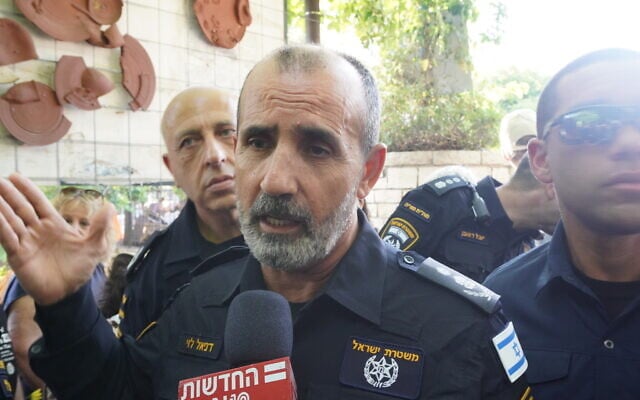 Police chief Danny Levy speaks to reporters at the beginning of the Jerusalem Pride Parade on June 5, 2025. (Charlie Summers/Times of Israel)