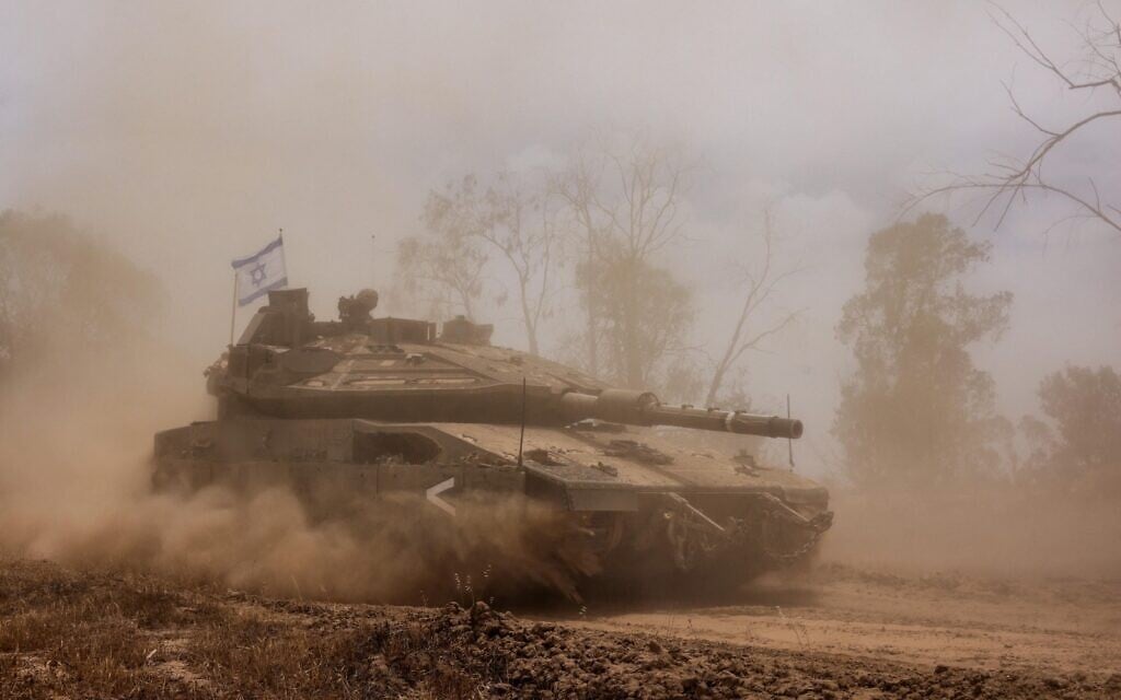 Troops of the 7th Armored Brigade operate in the Gaza Strip in a handout photo published on June 1, 2025. (Israel Defense Forces)