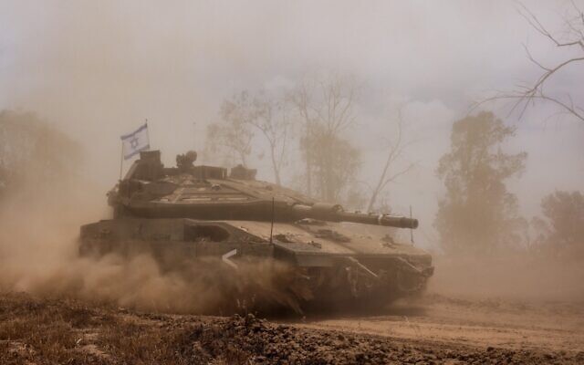 Troops of the 7th Armored Brigade operate in the Gaza Strip in a handout photo published on June 1, 2025. (Israel Defense Forces)
