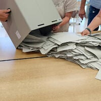 Illustrative: Voting ballots are emptied from a ballot box (iStock by Getty Images)