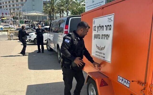 Prison Service guards at the site of a direct Iranian missile impact on Beersheba's Soroka Medical Center on June 19, 2025. (Israel Prison Service)