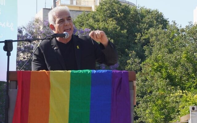 Opposition Leader Yair Lapid speaks to Jerusalem Pride Parade marchers in the city's Liberty Bell Park on June 5, 2025. (Charlie Summers/Times of Israel)