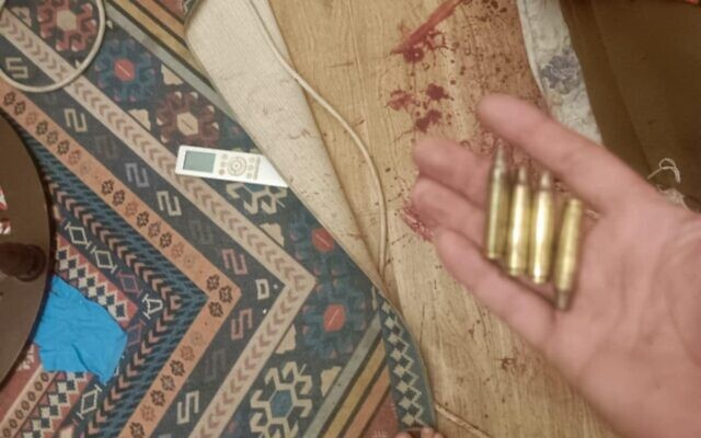 Four bullet casings that relatives say they found in Jassem al-Sadeh’s room after his death on May 28, 2025, along with traces of blood on the bed where they say he was sleeping. (Courtesy) Four bullet casings that relatives say they found in Jassem al-Sadeh’s room after his death on May 28, 2025, along with traces of blood on the bed where they say he was sleeping. (Courtesy)