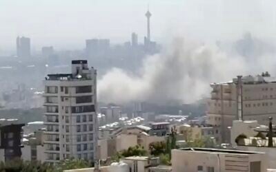 Smoke rises after an apparent Israeli airstrike in Tehran on June 18, 2025 (Screen grab from social media/used in accordance with Clause 27a of the Copyright Law)