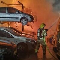 An Iranian missile attack sparks a fire in a parking lot in central Israel early on June 18, 2025 (X screenshot, used in accordance with clause 27a of the copyright law)